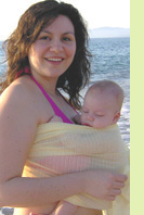 With my little baby at the sea in a solarveil sling