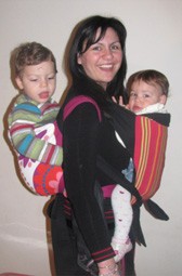 Carrying two children together in a baby carrier