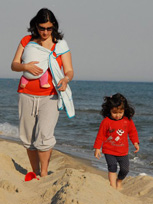 With a newborn at the seaside