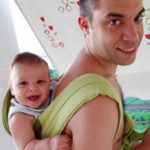 Dad with baby on his back