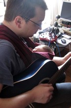 Dad makes music with his baby