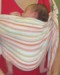 Newborn baby in an upright position