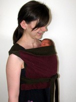 A newborn in a carrier