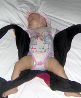 A baby that keeps sleeping after an outing in a mei tai