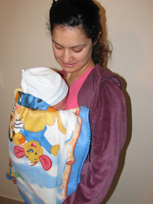 The baby's first walk, in an ergonomic carrier