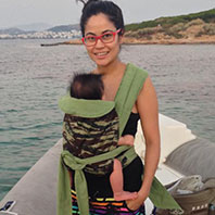 a baby in an Asteraki mei tai carrier