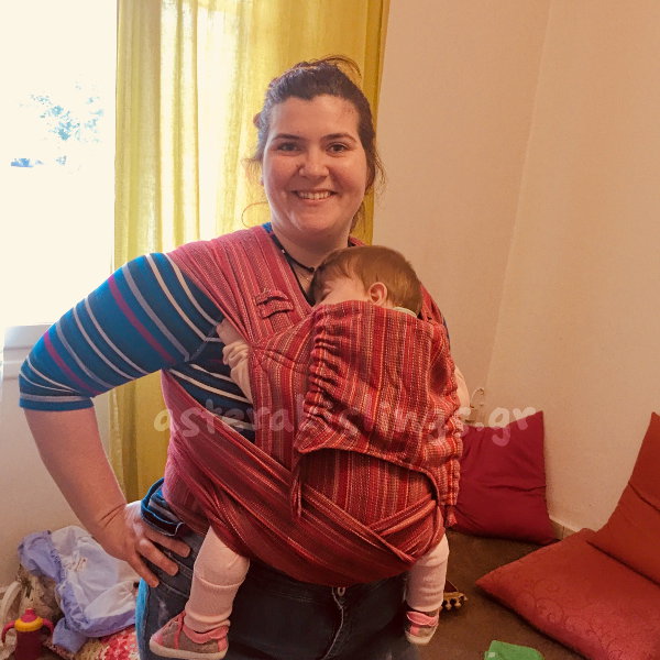 A big baby in an Asteraki wrap carrier