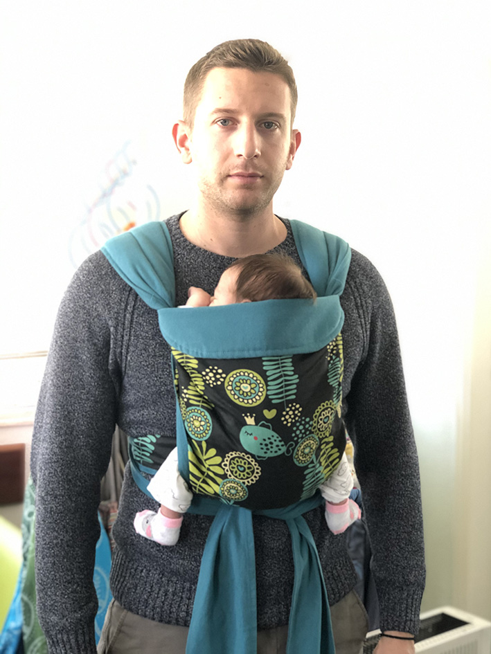 Dad with newborn in a mei tai