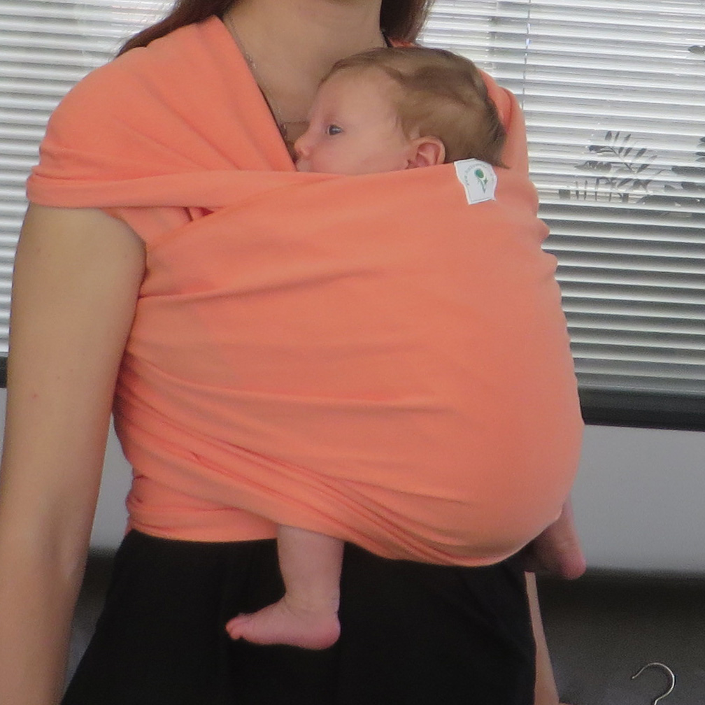 Stretchy wrap with a newborn