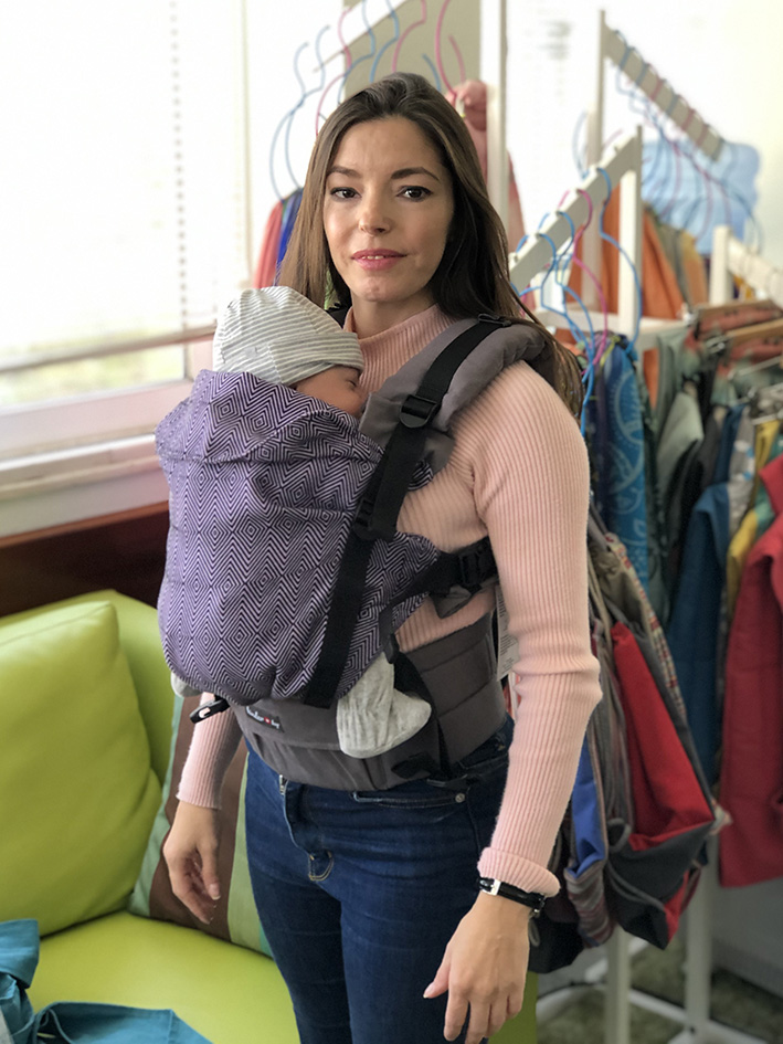 Petite mum with newborn in a Kinder Hop