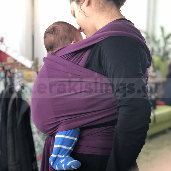 Newborn in a wrap — J-shape position